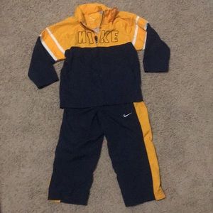 Nike 3T track suit, mesh lined. Gold/ navy/ white